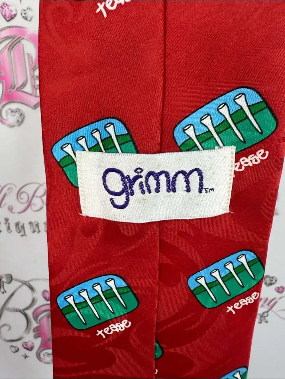GRIMM tie golf tease Red Tie with Teal Cupcake Motif T time